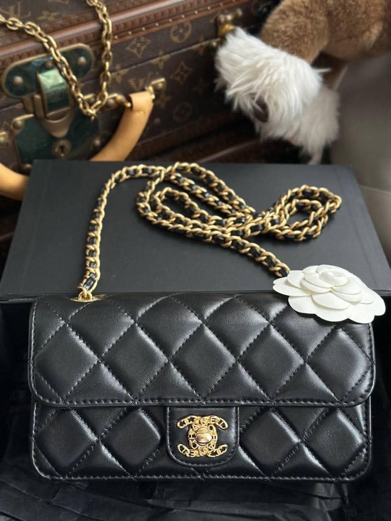 CHANEL Handbags - CHANEL Black Quilted Lambskin Chain Wallet with Gold Hardware